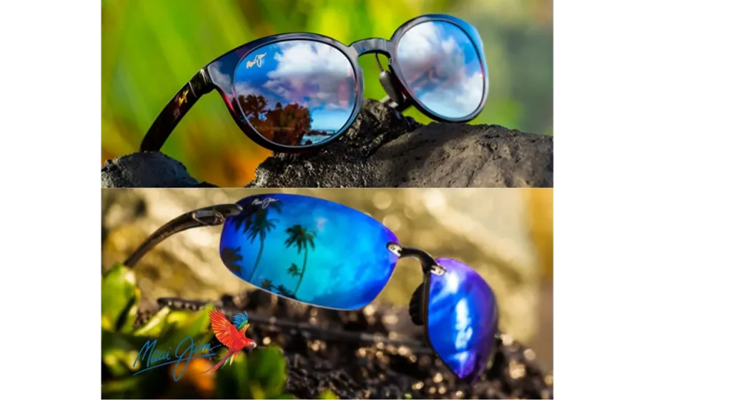 Twee Maui Jim zonnebrillen met blauwe gepolariseerde glazen op zwarte rots